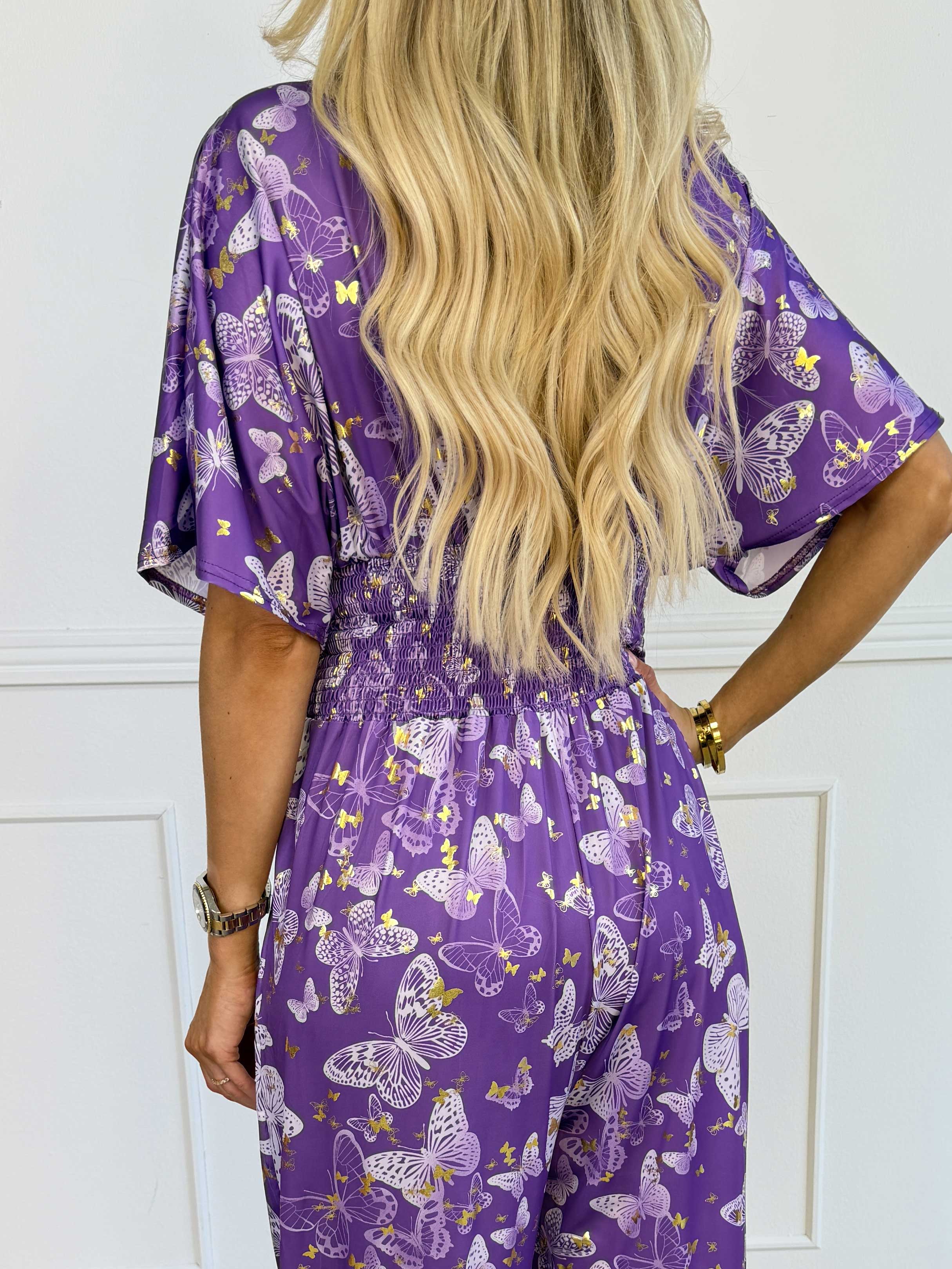 Pams Butterfly Jumpsuit - Elastisk plus size jumpsuit med fjärilsmönster